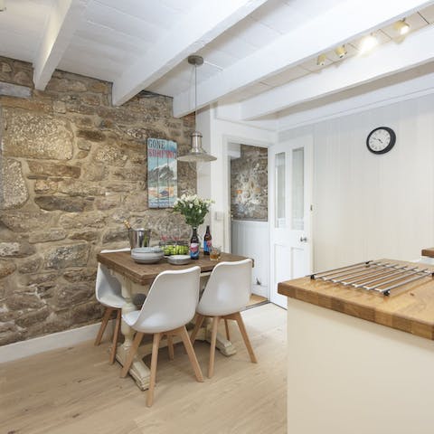 Admire the home's character features – exposed stone walls, beamed ceilings and sash windows