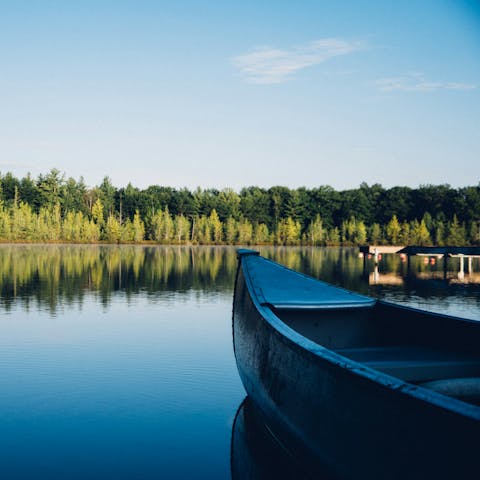 Explore Saddle Lake by the canoe or kayaks provided