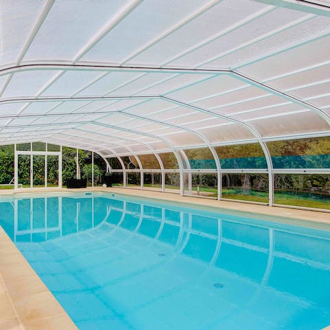 The covered heated swimming pool 