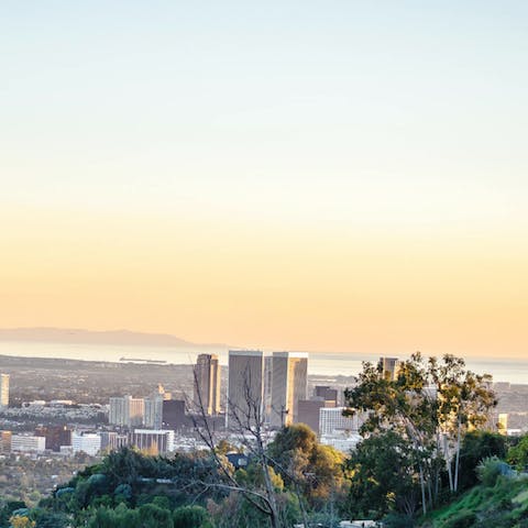 Admire the incredible views over the city from your terrace