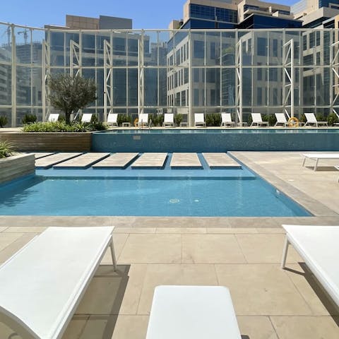 Lounge in the sun or have a swim in the communal pool 