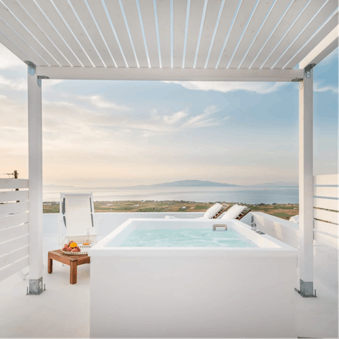Spend leisurely afternoons relaxing in your private outdoor Jacuzzi 