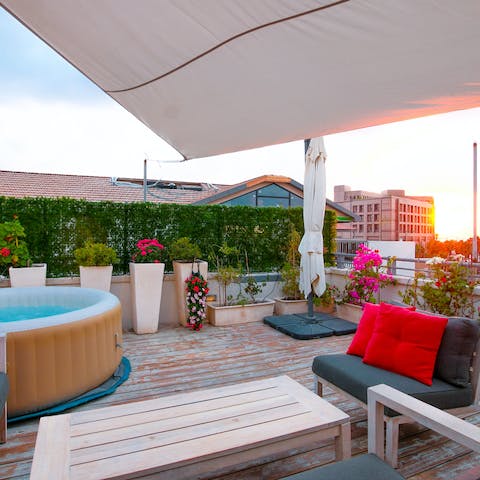 Catch the last of the evening sun from your private rooftop terrace