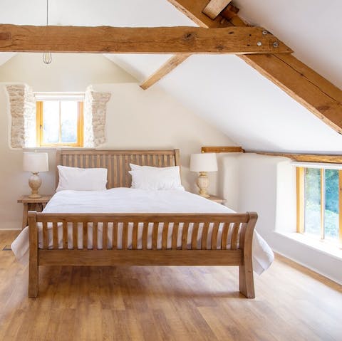 Enjoy a restful night's sleep under the wooden beams