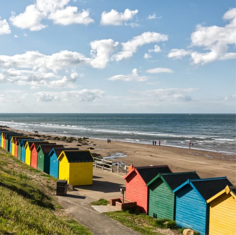 Relax on the sands of West Cliff Beach, a five-minute walk away