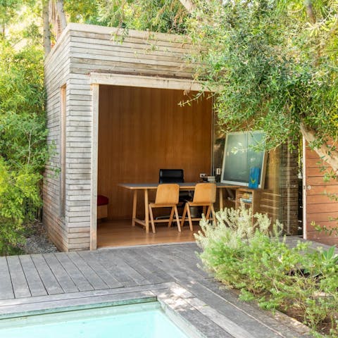 Catch up on work in the chic garden office