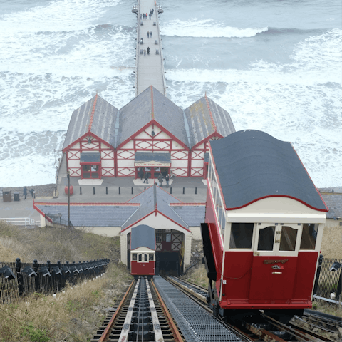Get the iconic Saltburn Cliff Lift down to the beach and enjoy a paddle in the waves