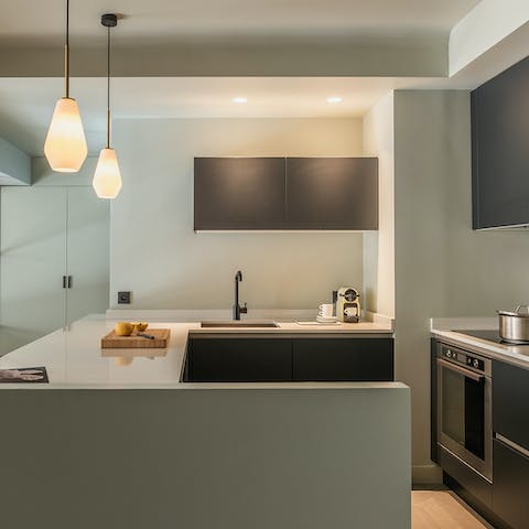 Make yourself a coffee in the sleek kitchen while prepping for the day's activities