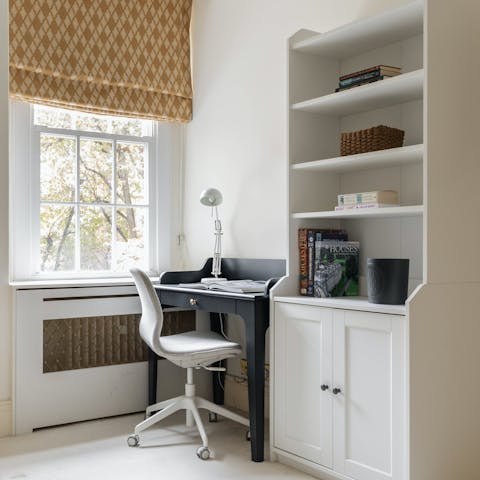 Hunker down at the bedroom’s desk when you need to work from home