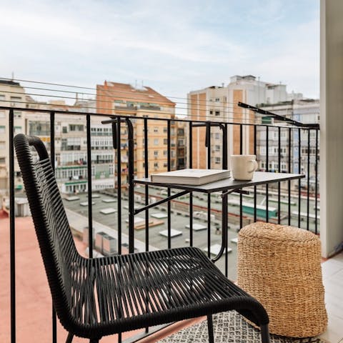 Take in views of the Eixample neighbourhood from the balcony