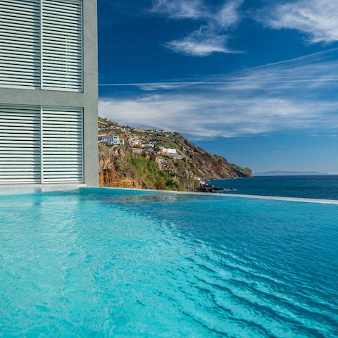 Swim in the infinity pool, overlooking the soothing seascape 