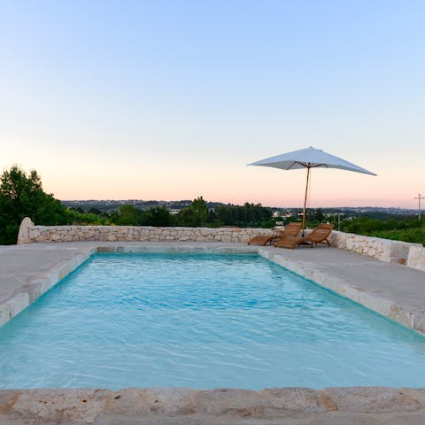 Take an evening dip in the beautifully rustic pool