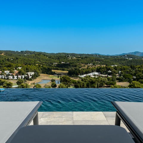 Feel on top of the world in the sparkling infinity pool