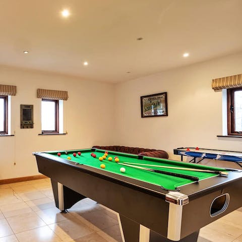 Practise your skills at the pool table in the communal games room
