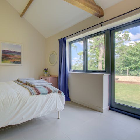 Wake up to verdant garden views in this tranquil retreat