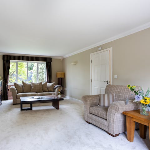 Relax in the cosy living room after a stroll through Wimbledon Park