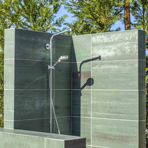 Rinse off in the poolside shower