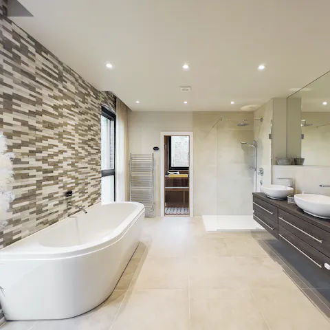 Rejuvenate in the freestanding bath and sauna in the main ensuite after a workout