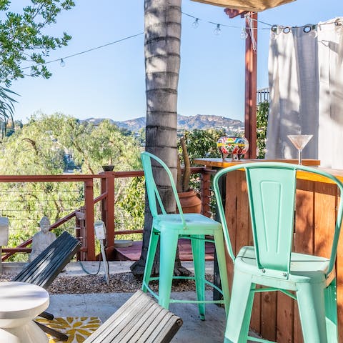 Experience the magic of California living from the outdoor Tiki bar