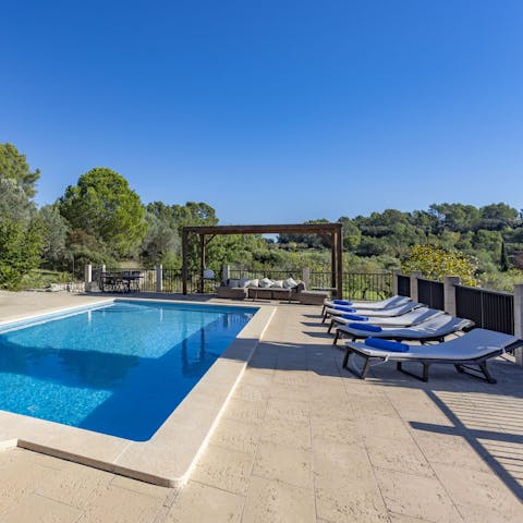 Spend relaxing days admiring the views whilst lounging by the pool