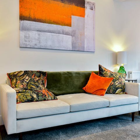 Relax in the colourful living space after a day exploring Cardiff