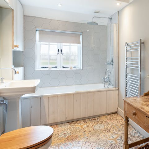 Relax in the large tub after a long day of walking and exploring this wholesome corner of Kent