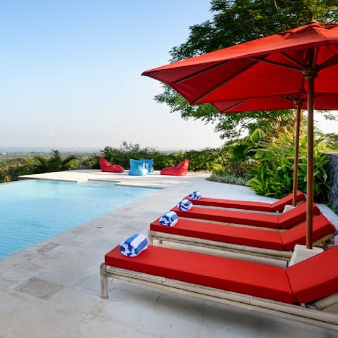 Soak up the sunshine on the poolside loungers