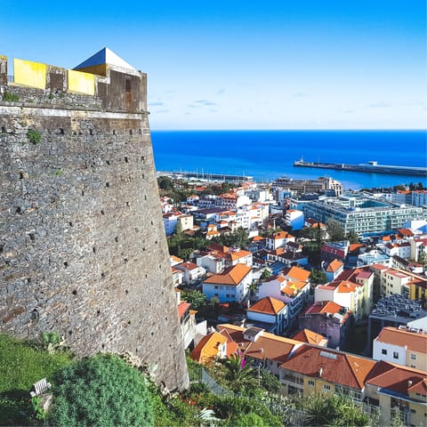 Drive into Funchal and explore the Fort of São Tiago