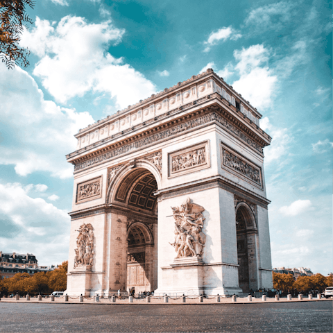 Gaze up at the spectacular Arc de Triomphe, a five-minute walk away