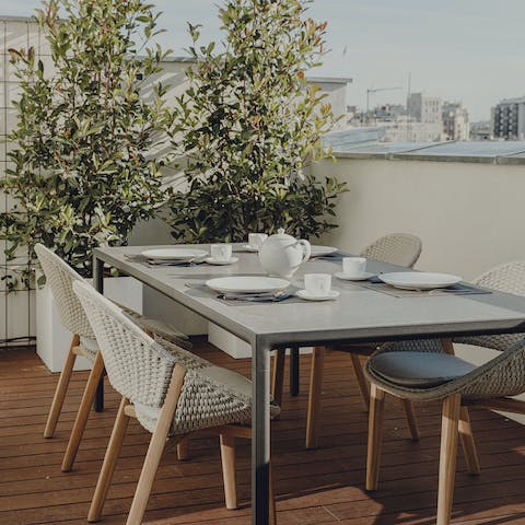 Enjoy blissful breakfasts on the private terrace overlooking Madrid's rooftops