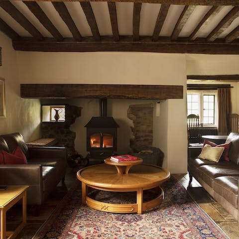 Cosy up by the wood burner as evening draws in