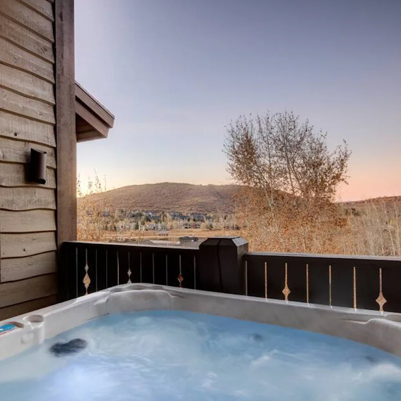 Enjoy the view over the Deer Valley mountains as you soak in the hot tub