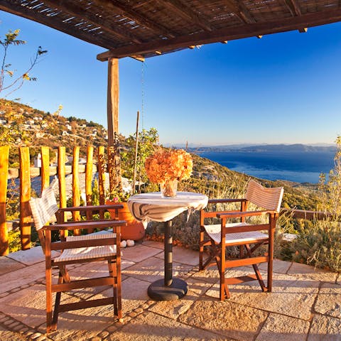 Start your day with a coffee around the bistro table, looking out to Pagasitikos Bay