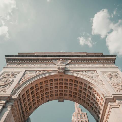 Gaze up at Washington Square Park's iconic arch, just a stone's throw from your apartment