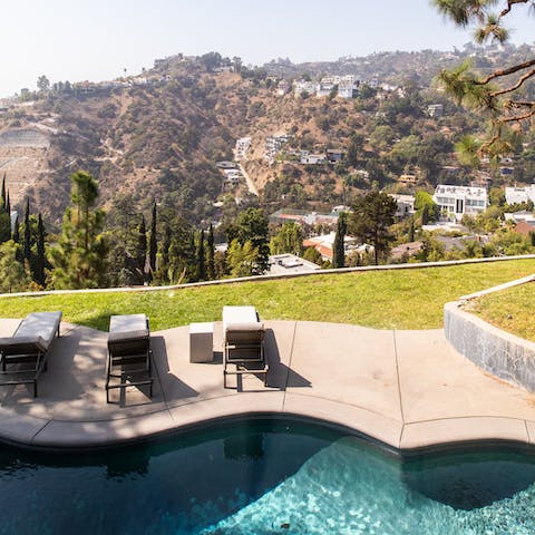 Lounge with a cocktail and admire the views across the Hollywood Hills