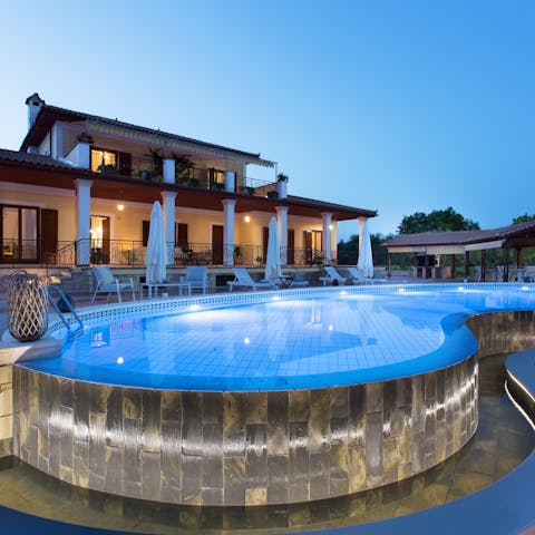 Take a twilight dip in the sparkling pool