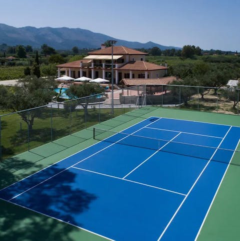 Practise your serve on the tennis court