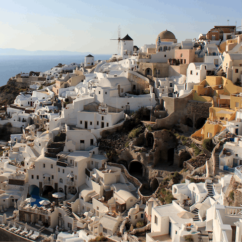 Explore the boutiques, restaurants and bars of Oia a few minutes' walk away