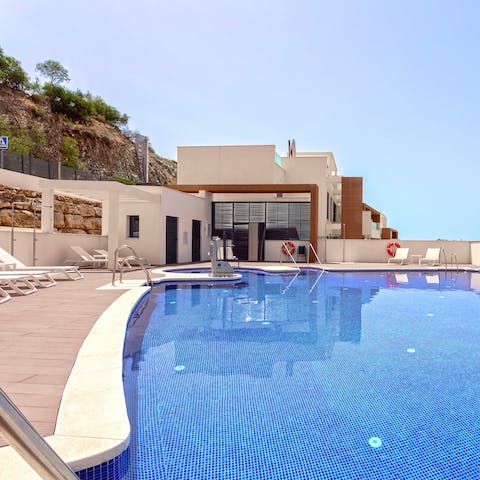 Cool off from the Costa del Sol heat in the shared pool