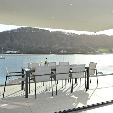 Dine alfresco in a sublime setting by the water