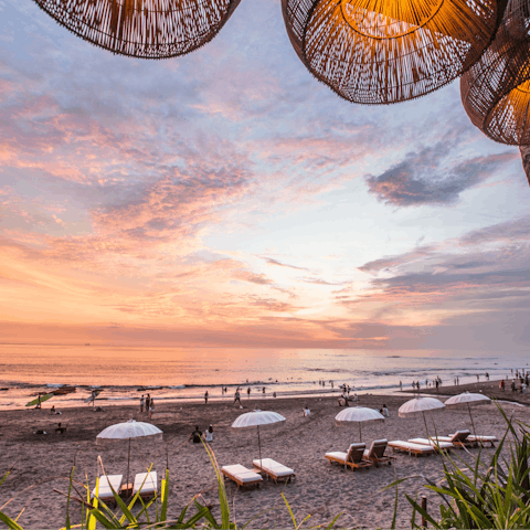 Watch the sunset at Canggu Beach, a short drive or bicycle ride away