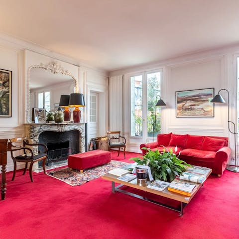 Embrace old world France by the ornate fireplace in the living room