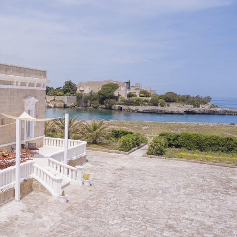Stay on the water's edge, overlooking the historic castle of Santo Stefano