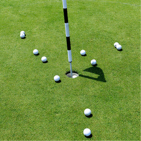 Play a round at the nearby golf course