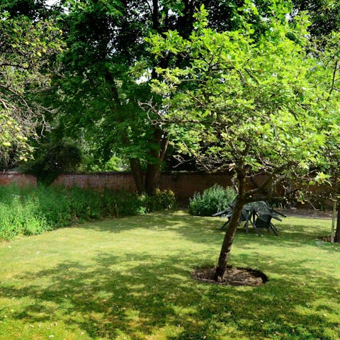 Enjoy a sunny picnic in the expansive communal garden
