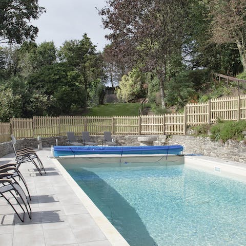 Slip into the inviting heated pool on warm summer days