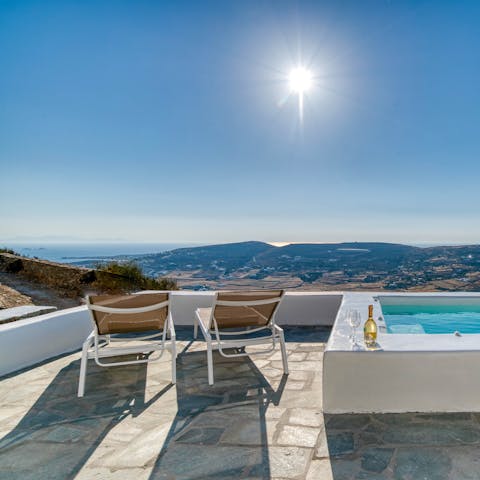 Pull up a sun lounger and gaze at immense views of Paros