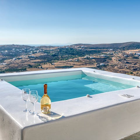 Dip your feet in the hot tub while you sip on a glass of athiri wine