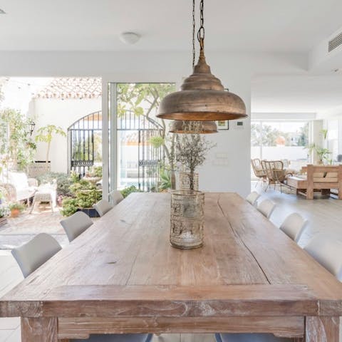 Gather together for sociable meal times around the dining table or enjoy a glass of wine out in the courtyard