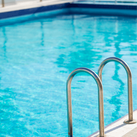 Unwind in the communal pool and gym